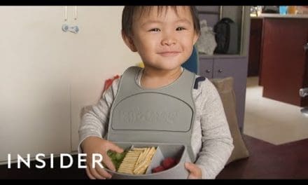 Travel Bib Has Three Compartments To Hold Kids’ Snacks